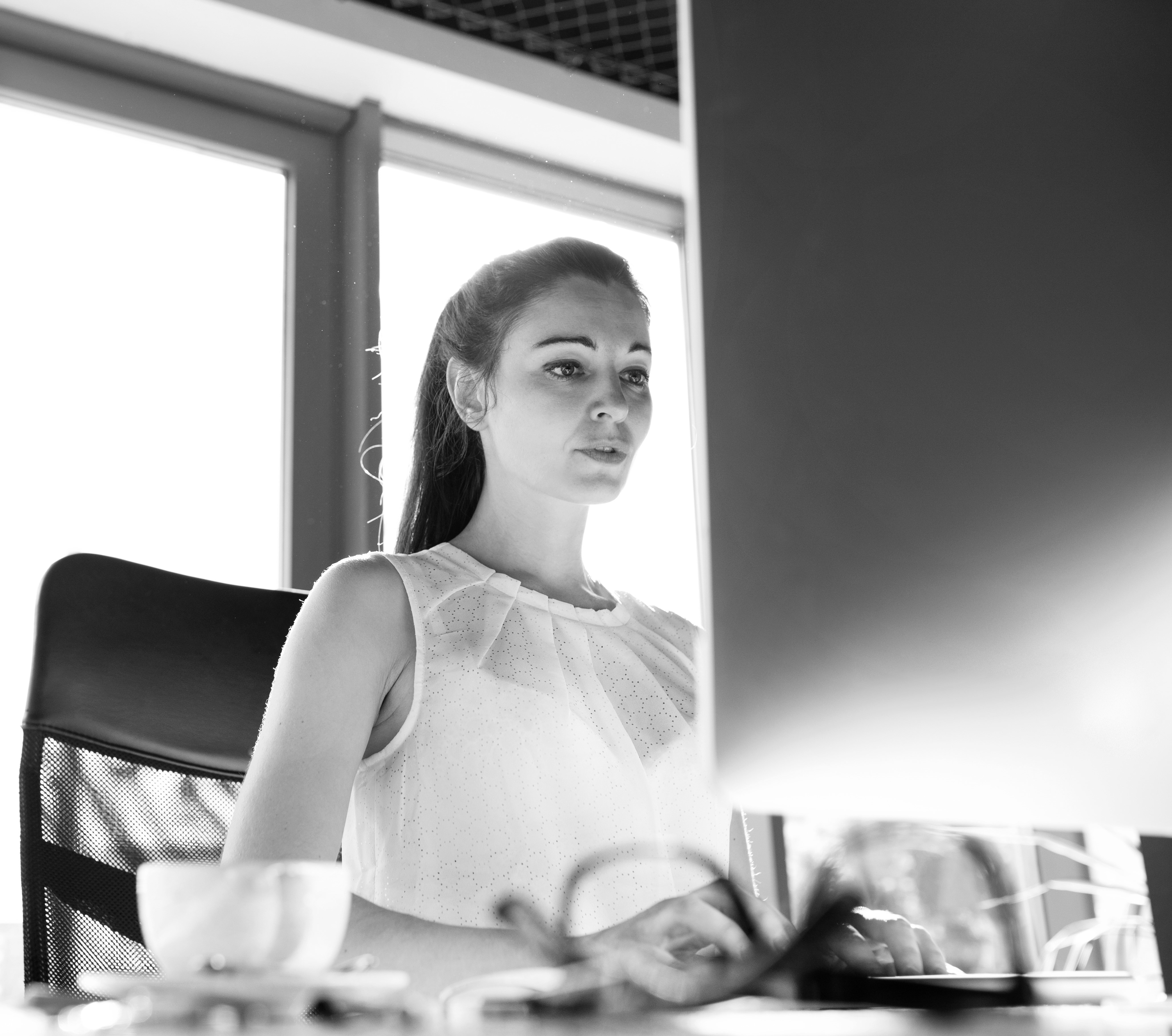 Businesswoman with computer working | Premier Energy