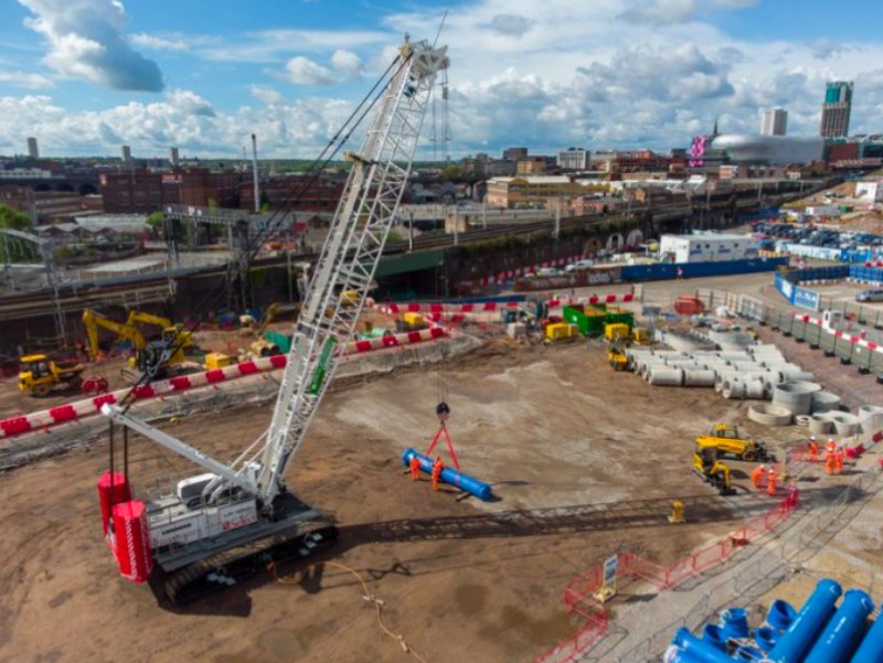 washwood heath project showing large crane carrying blue pipe